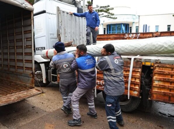Antalya'da hortum ve fırtına sonrası üreticiye sera naylonu yardımı.